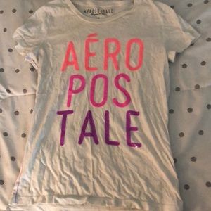 Short sleeve shirt with pink and purple wording